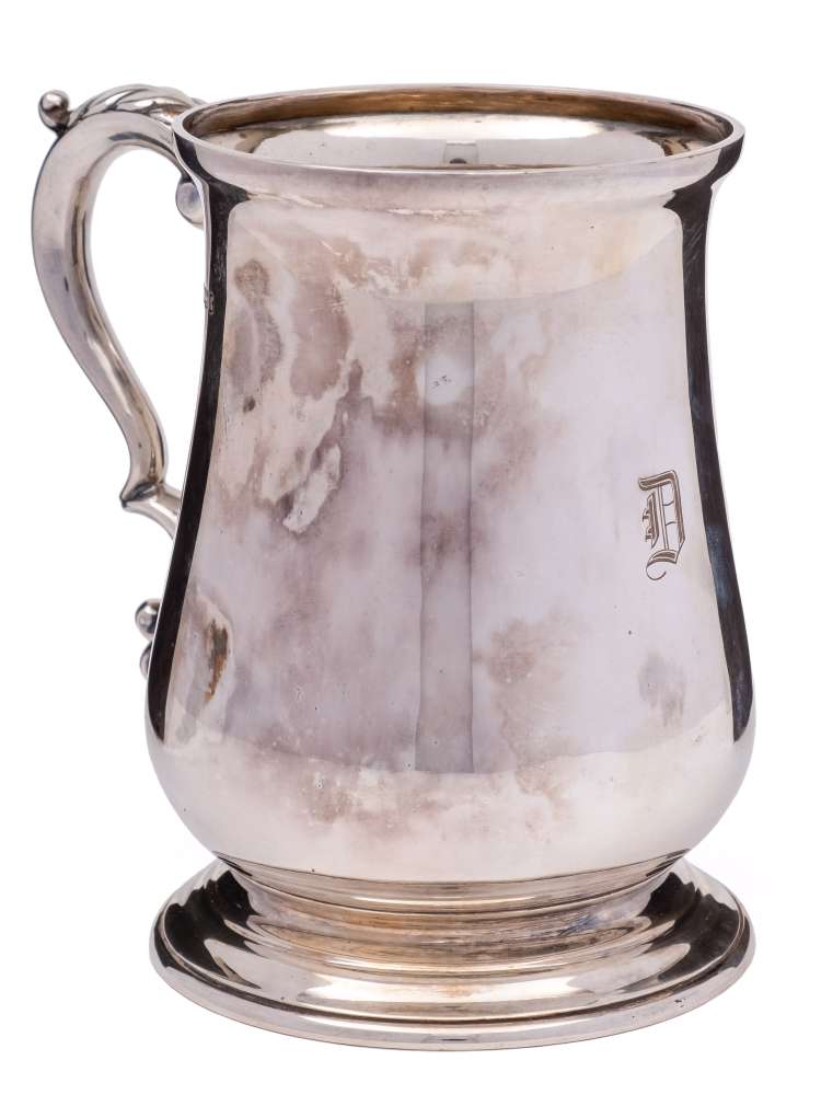 A George V silver tankard, maker Atkin Brothers, Sheffield, 1924: initialled, of baluster form,