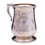 A George V silver tankard, maker Atkin Brothers, Sheffield, 1924: initialled, of baluster form,