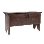 A late 17th Century oak plank coffer:, with a plain rectangular hinged moulded top,
