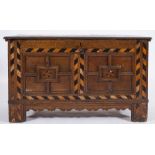 A late 17th/early 18th Century oak rectangular coffer:, with a hinged moulded top,