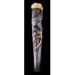 A Japanese ivory and silver parasol handle: decorated with a stag beetle and tree frog attacking a