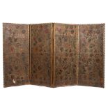 An embossed leather four-fold low screen in the William Morris taste:,