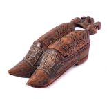 An 18th Century treen novelty snuff box: in the form of a pair of shoes,