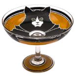 A Continental Art Deco period glass comport: the exterior boldly decorated with three black cats