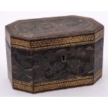 An 19th Century Chinese export ware tea caddy: of rectangular outline and canted corners,