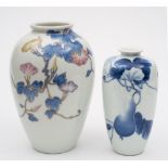 A Japanese porcelain ovoid vase by Genroku and one similar: the first painted in underglaze blue,