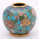 A Chinese cloisonne jarlet: decorated with peony sprays and an inscription on a turquoise ground