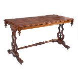 A Victorian rosewood centre or library table:,