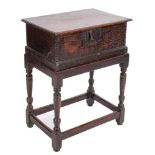 An 18th Century oak rectangular bible box:, on a later stand,