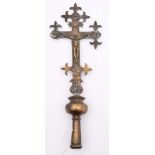 A 17th Century-style cast brass processional crucifix: the cross with fleur-d-lys terminals and