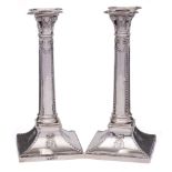 A pair of Victorian silver candlesticks, maker Thomas Bradbury & Sons,