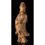 A Chinese carved soapstone figure of Guanyin and a soapstone brush washer: Guanyin wearing flowing