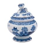 A Bow blue and white toilet pot and cover: of globular form with gadroon moulded cover and flower
