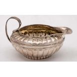A George III silver cream jug, maker TH possibly Thomas Hobbs, London,