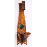 An Arts & Crafts period copper wall light: the shaped and tapering backplate with coned chimney,