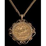 A sovereign dated 1906 mounted as a pendant: within a 9ct gold frame and on a 9ct gold curb-link