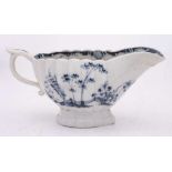 A Plymouth blue and white sauceboat: of fluted form with scroll handle and thumbrest,
