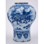 A large Dutch blue and white delft jar: of octagonal baluster form,