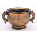 A Chinese inlaid bronze censer: with flared rim and stylised mythical beast handles,