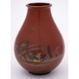 A Japanese bronze vase: of ovoid form, decorated with mandarin ducks amongst reeds, signed, 19cm.