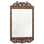A carved walnut rectangular mirror in the William and Mary taste:,