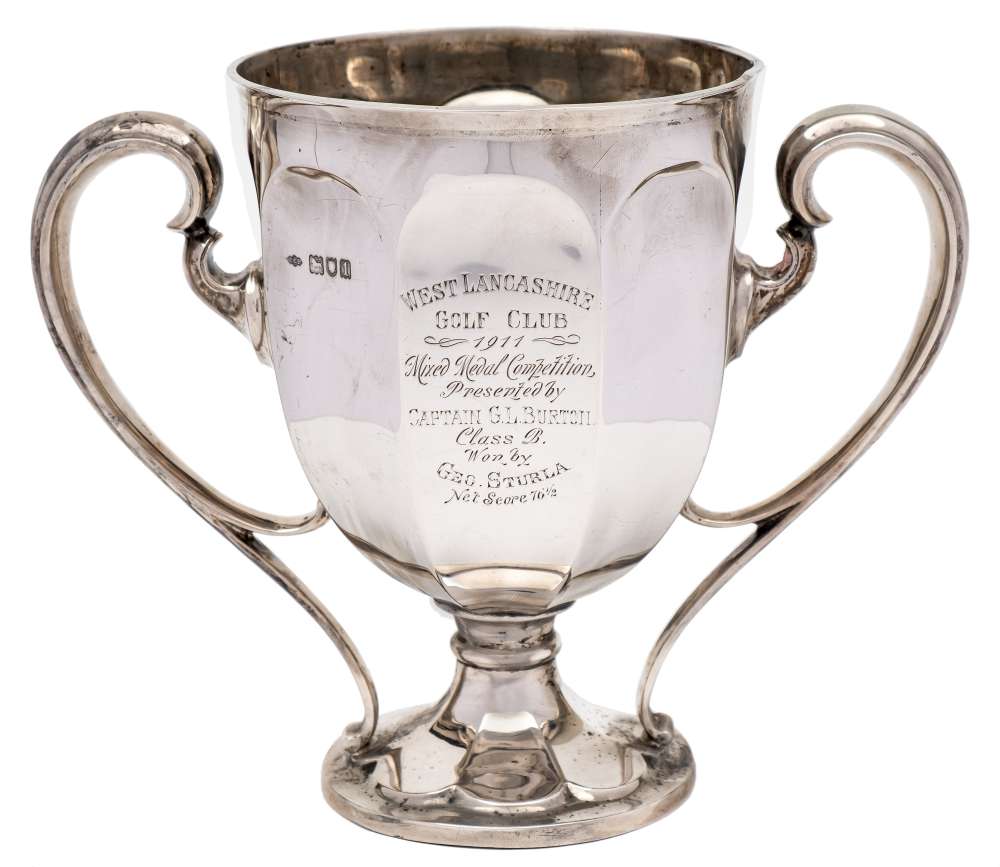 An Edward VII silver two handled trophy cup, maker Sibray, Hall & Co, Ltd, London, 1906: inscribed,