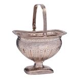 A Dutch silver swing-handled pedestal sugar basin,