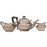 A George V silver three-piece tea service.