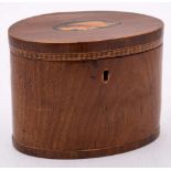 An 18th Century mahogany and inlaid oval tea caddy: the hinged lid with inlaid conch shell