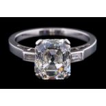 A diamond single-stone ring: the Asscher-cut diamond approximately 8.2mm long x 7.4mm wide x 4.