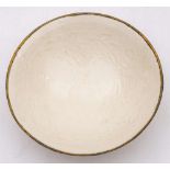 A Chinese cream glazed porcelain dish: in Song Dynasty style,