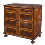 A William & Mary walnut oyster veneer, sycamore banded and inlaid rectangular chest:,