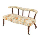A pair of Victorian walnut love seats:, of shaped outline, one upholstered in a pastel green fabric,