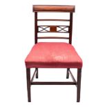 A set of six Regency mahogany dining chairs:, the backs with moulded curved bar top rails,