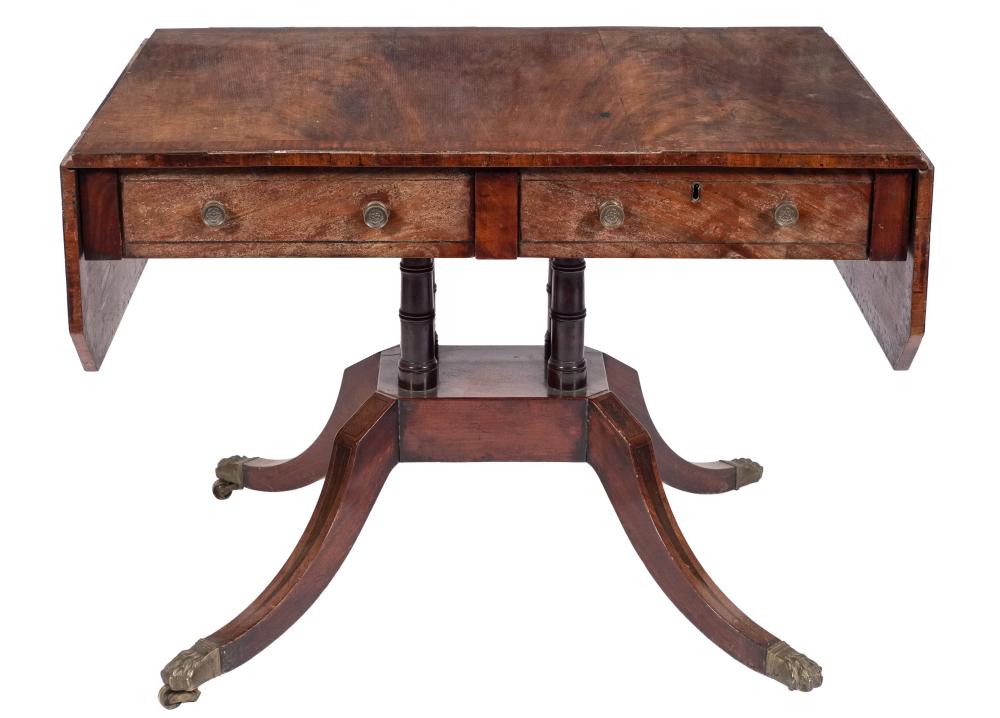 A Regency mahogany crossbanded and inlaid sofa table,: bordered with boxwood and ebony lines,