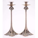 A pair of Art Nouveau Secessionist plated metal candlesticks: in WMF style,