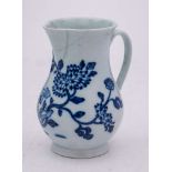 A Liverpool [Richard Chaffers] blue and white baluster cream jug: painted with chrysanthemum and