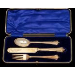 An Edward VII silver gilt three-piece Albany pattern christening set, maker Joseph Rodgers & Sons,