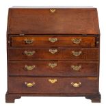 A George III mahogany bureau:,