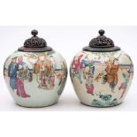 A pair of Chinese famille rose ginger jars: painted with a terrace court scene with the Immortal