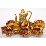 A Royal Worcester fruit painted coffee service: comprising a coffee pot and cover, cream jug,