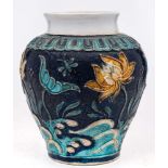 A Chinese Fahua stoneware baluster jar: decorated with insects flying amongst lotus flowers and