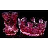 A Bohemian ruby flashed cut glass bowl and a similar beaker: the octagonal bowl on hobnail cut base,