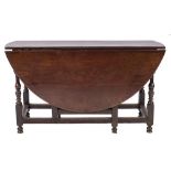 An early 18th Century walnut gateleg table:,