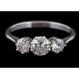 A diamond three-stone ring: set with round old brilliant-cut diamonds,