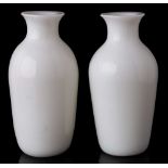 A pair of Chinese Peking white glass vases: of baluster form with flattened rims, 11cm.