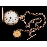 A gold plated hunter pocket watch: the white enamelled dial with Roman numerals and subsidiary