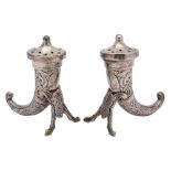 A pair of Scandinavian silver pepperettes,