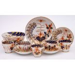 A Spode 'Imari' porcelain part tea service: painted in the so called 'Banana Tree' pattern,