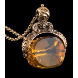 A mid 19th Century citrine mounted swivel seal: of chased foliate design,